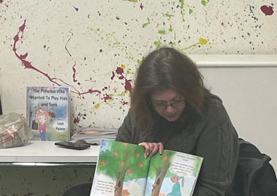 Leah reading her book